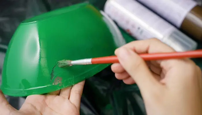 Try A Plastic-Safe Paint Remover