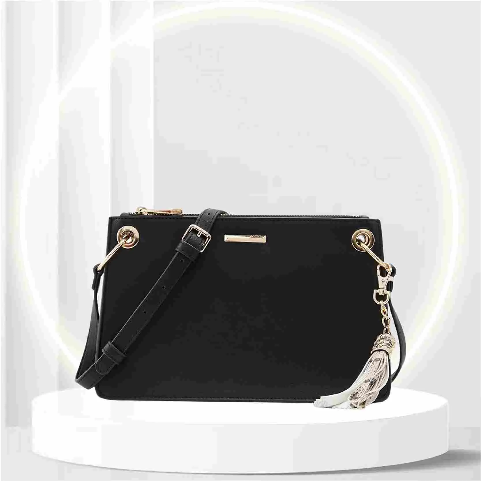 ALDO Women's Pouilley Crossbody Handbag With Adjustable Strap and Tassel detail, Black