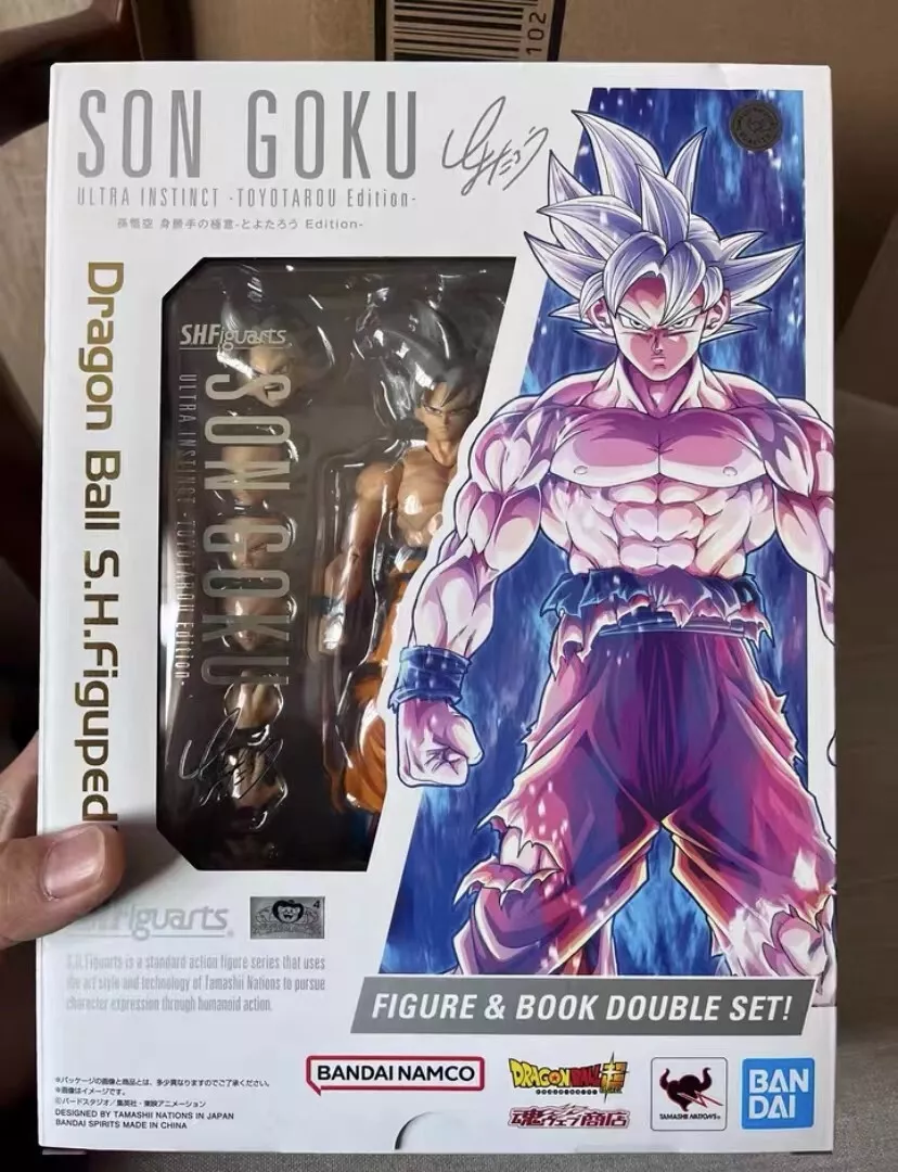 sh figuarts son goku ultra instinct toyotarou edition figure & book set v-jump